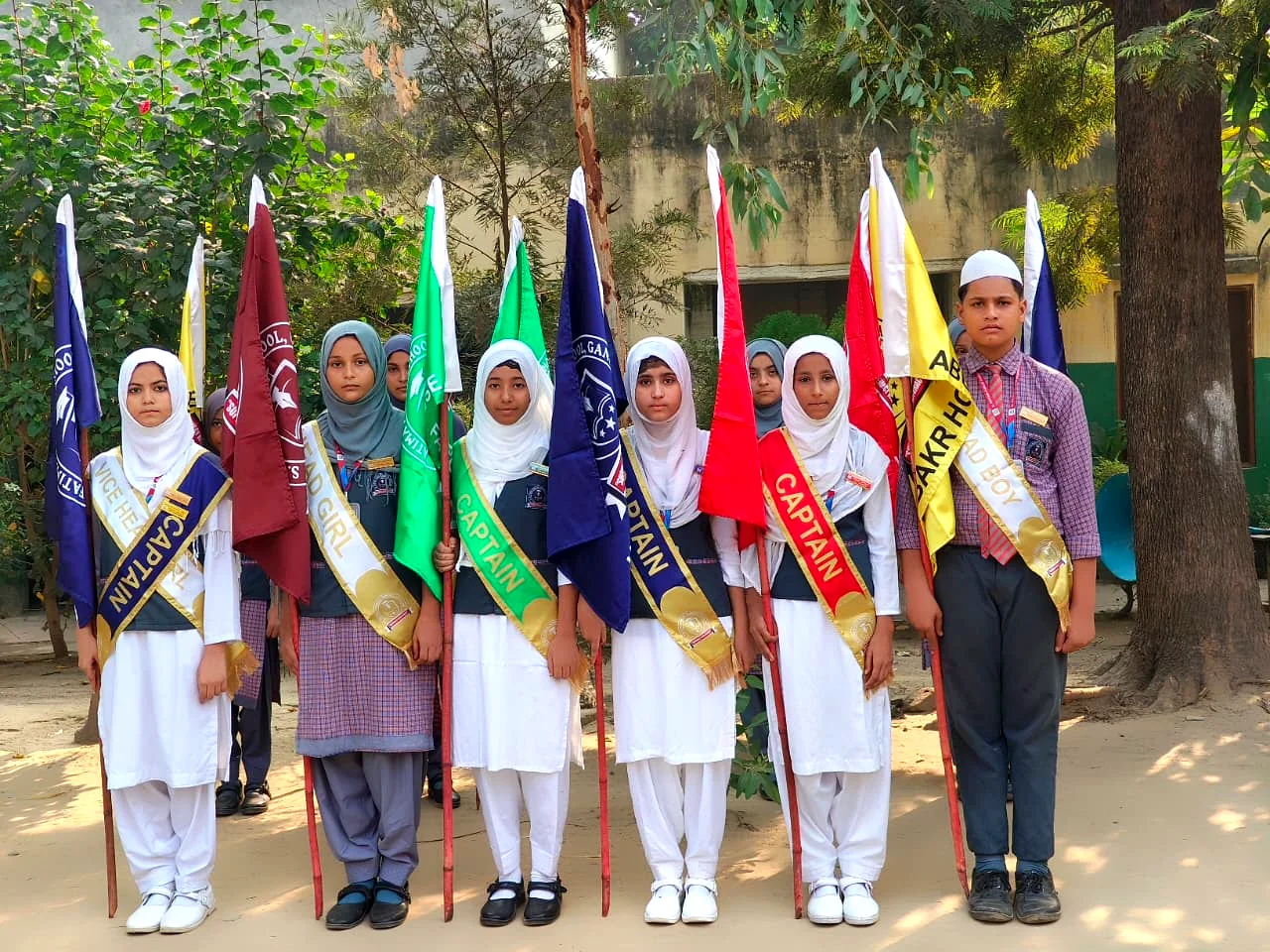 Students taking part in a flag ceremony.