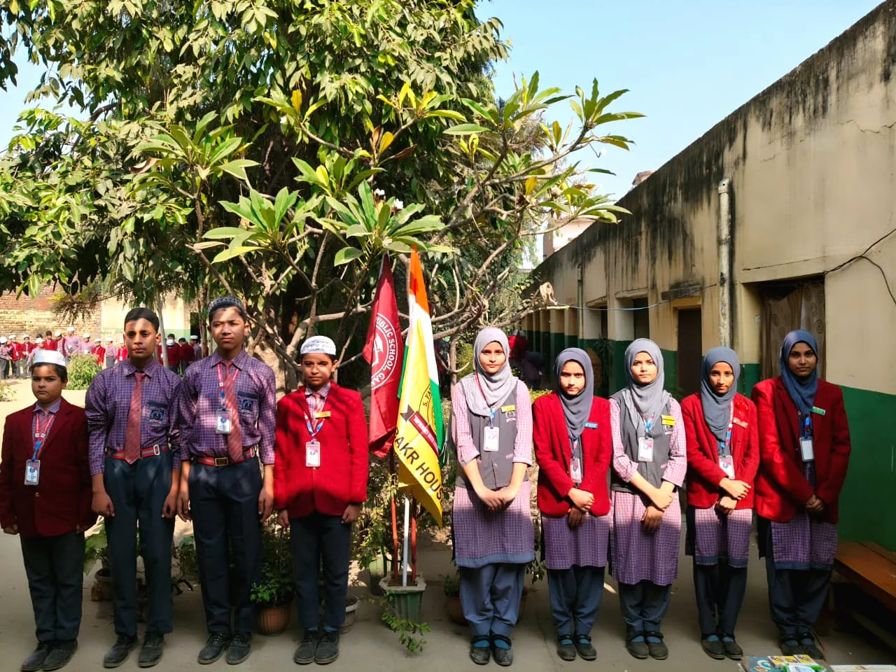 Students and educators gathered outside the school.